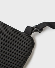 color: black ~ alt: GBY Ultralight - Cross-Body Bag 02 - Back Detail ~ info: Ventilated back detail
