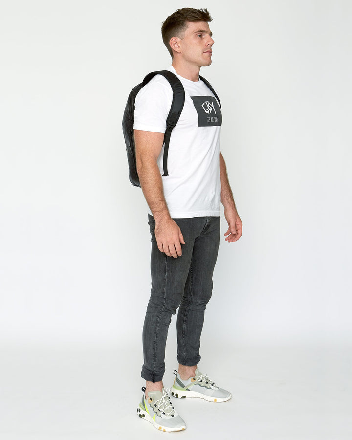 color: black ~ alt: GBY Ultralight Laptop Day Pack Lightest In The World - 3/4 view ~ model_h: 5'11